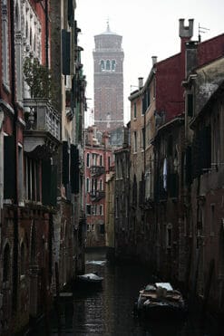 Calming framed photo of a waterway in Venice, Italy, taken by Photographer Scott Allen Wilson, with the Bell Tower of Santo Stefano standing in the background.
