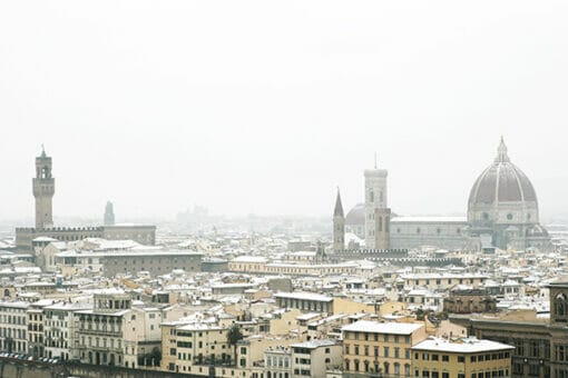 A beautiful photo of Florence, Italy with snowy rooftops taken by Photographer, Scott Allen Wilson