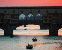 Ponte Vecchio in Florence, Italy, is captured at sunset by Photographer Scott Allen Wilson.