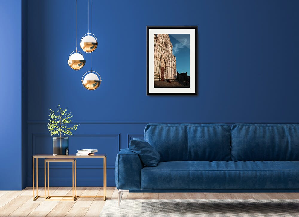 The print captured by Photographer, Scott Allen Wilson of the church of Santa Croce in Florence, Italy, decorates a living room