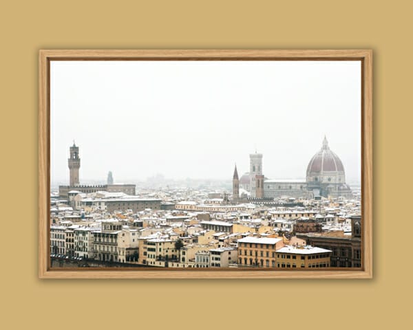 A beautiful photo of Florence, Italy with snowy rooftops taken by Photographer, Scott Allen Wilson