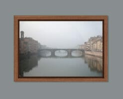 A framed print of Ponte Santa Trinita in Florence, Italy taken in the midst of a dense fog by Photographer Scott Allen Wilson.