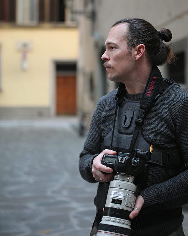 Portrait of Scott Allen Wilson holding his camera in Florence, Italy