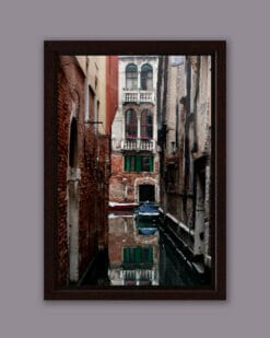 Relaxing photo of a corner in Venice, Italy, taken by Photographer Scott Allen Wilson, with a perfect mirror in the water.