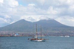 Mount Vesubio and boat landscape taken in Naples Italy by Photographer Scott Allen Wilson
