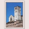 White framed photo the Basilica of St. Francis, located in Assisi, Italy was taken by Photographer Scott Allen Wilson.