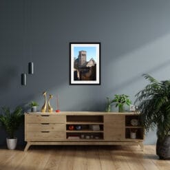 Wooden shelf decoration with a framed print of Cattedrale di San Rufino taken in Assisi, Italy by Photographer Scott Allen Wilson over a dark gray wall.