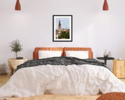 Orange and white decoration with a black framed print of San Tomaso Campanile by Photographer Scott Allen Wilson taken in Verona, Italy.