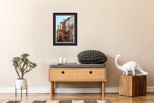Wooden minimalist decoration with white sculptures and the touch of color given by a framed print of streets in Verona, Italy by Photographer Scott Allen Wilson.