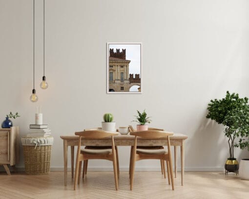 Wooden dining room decoration with a white framed print of elegant Palazzo della Gran Guardia in Verona, Italy by Photographer Scott Allen Wilson