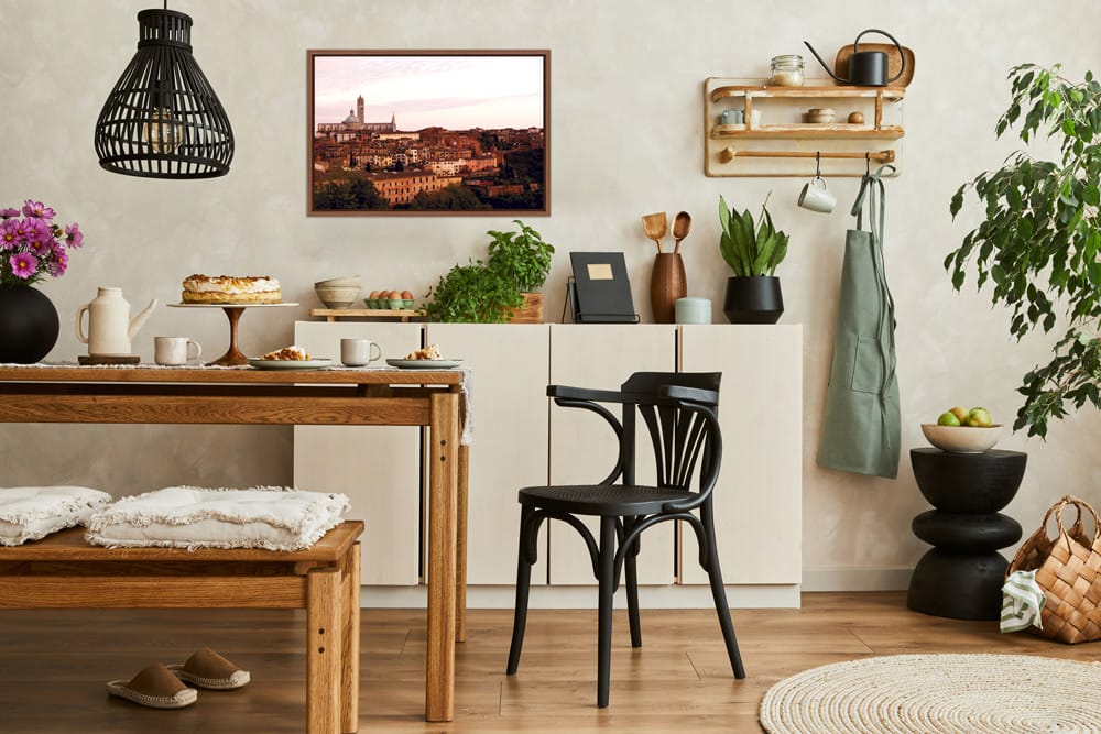Cozy kitchen decoration with a framed print of a sunset landscape of Siena, Italy taken by Photographer Scott Allen Wilson.
