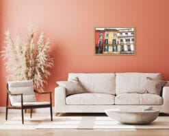 Pink wall living room design with a wooden framed print of colorful Liston 12, a popular bar and cafeteria in Verona, Italy, taken by Photographer Scott Allen Wilson.