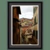 Gray framed print of the roof tops of a medieval street in Siena, Italy taken by Photographer Scott Allen Wilson