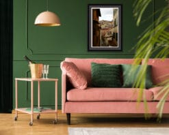 Green and pink living room decoration with a framed print of a medieval street in Assisi, Italy taken by Photographer Scott Allen Wilson.