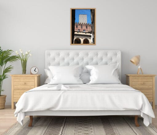 White bedroom decoration with wooden furniture and a framed print of the Duomo di Siena, Italy taken by Photographer Scott Allen Wilson.