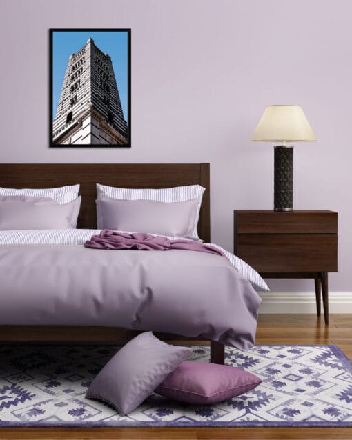 Purple bedroom decoration with a framed print of the campanile of the Duomo di Siena taken by Photographer Scott Allen Wilson.