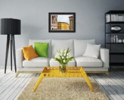Modern black living room decoration with bright color elements such as a framed print of colorful buildings in Verona, Italy taken by Photographer Scott Allen Wilson