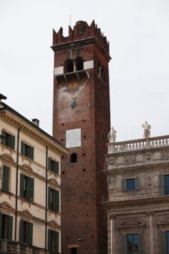 Artistic photo of the corner of Piazza delle Erbe with Torre del Gardello standing in the middle taken by Photographer Scott Allen Wilson in Verona, Italy.