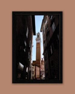 Framed print of Palazzo Pubblico framed by a narrow medieval street in Siena, Italy, taken by Photographer Scott Allen Wilson.