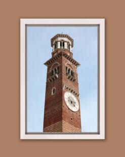 Color framed print by Photographer Scott Allen Wilson capturing from a low angle the Clocktower named Torre de Lamberti located in Verona, Italy.