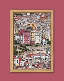 Framed print of a landscape of Naples, Italy that shows the spirit of the city with its crowded, colorful buildings taken by Photographer Scott Allen Wilson.