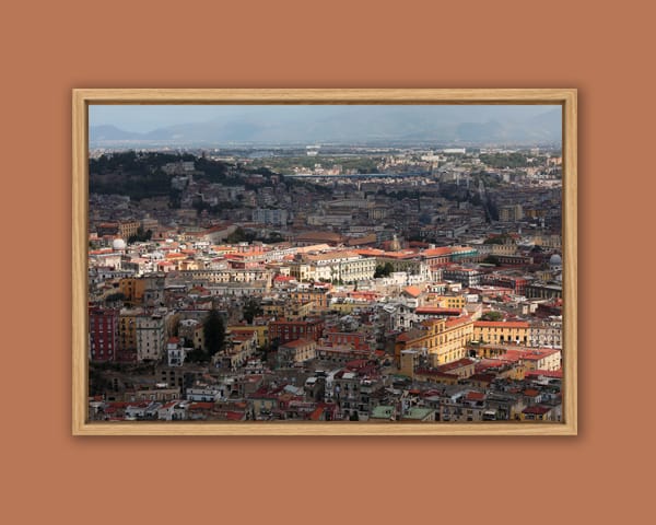 Wooden framed print of an amazing overview of Naples, Italy with a ray of light running through captured by Photographer Scott Allen Wilson