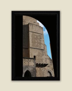 Framed print of the Santa Chiara religious complex in Naples, Italy behind an arched wall taken by Photographer Scott Allen Wilson