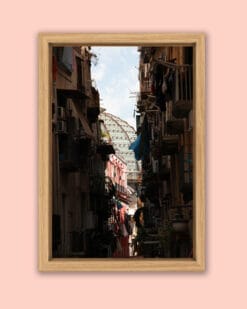 Framed photo of the dome of Galleria Umberto I between a narrow street in Naples, Italy taken by Photographer Scott Allen Wilson
