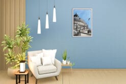 Light blue interior design with a blue wall that combines with the sky of a framed print of a Venetian Church taken by Photographer Scott Allen Wilson.