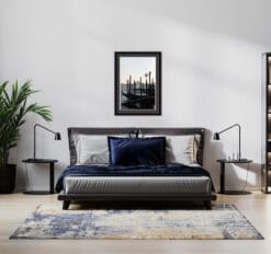 Sober modern bedroom decoration with a gray framed picture of an old dock in Venice, Italy taken by Photographer Scott Allen Wilson