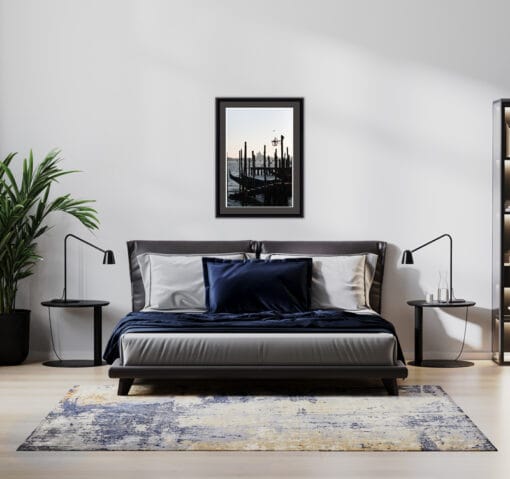 Sober modern bedroom decoration with a gray framed picture of an old dock in Venice, Italy taken by Photographer Scott Allen Wilson