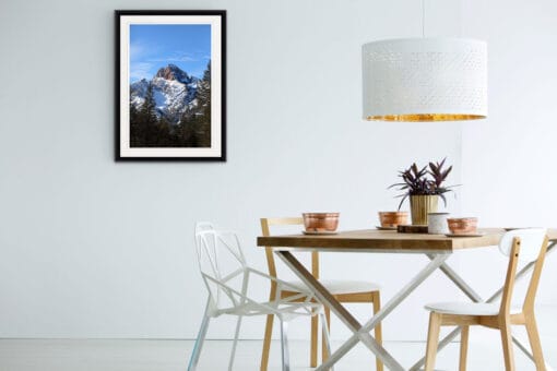 Minimalist dining room decoration with a framed print of the Dolomites, Italy by Photographer Scott Allen Wilson.
