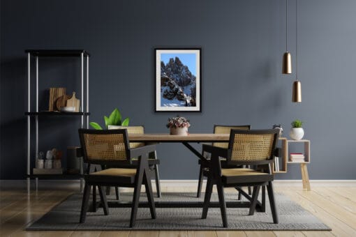 Modern gray dining room with a framed print of the Dolomites, Italy taken by Photographer Scott Allen Wilson.