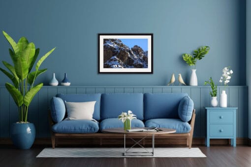 Blue living room decoration with a print showing the blue shades of the snow-capped mountains in the Dolomites, Italy taken by Photographer Scott Allen Wilson.