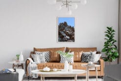 Modern living room decoration with leather sofa and a framed print of the Dolomites rocky mountains taken by Photographer Scott Allen Wilson.