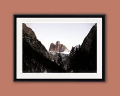 Framed print of mountain peaks in the middle of two mountains from the Dolomites, Italy taken by Photographer Scott Allen Wilson.