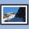Nature framed print of two jagged peaks of the Dolomites, Italy with an intense blue sky in the background taken by Photographer Scott Allen Wilson.