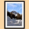 Portrait framed photo of a snow path leading to a snow-capped mountain of the Dolomites, Italy taken by Photographer Scott Allen Wilson.