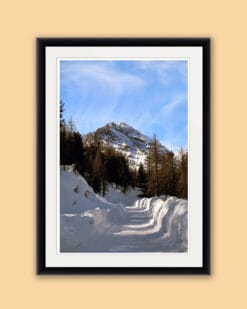 Portrait framed photo of a snow path leading to a snow-capped mountain of the Dolomites, Italy taken by Photographer Scott Allen Wilson.