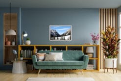 Colorful living room decoration with a landscape framed photo of the dolomites covered in snow taken by Photographer Scott Allen Wilson.