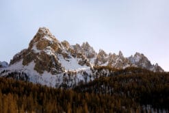 Snow peaks in the Dolomites on earthy fall colors taken by Photographer Scott Allen Wilson.