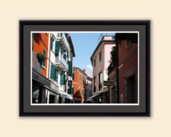 Framed photo of the colorful buildings in Peschiera del Garda, Italy taken by Photographer Scott Allen Wilson.
