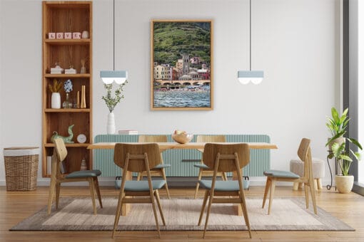 The print of the beach of Monterosso al Mare, Italy, hangs in a kitchen with wooden decor. By Photographer Scott Allen Wilson.
