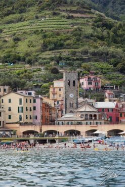 The vineyards contrast with the colorful buildings on the beach of Monterosso al Mare, Italy. By Photographer Scott Allen Wilson.