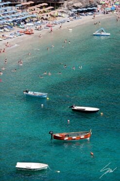 Monterosso al Mare, Cinque Terre, Italy: colorful boats and people enjoying the sun on the beach. By Photographer Scott Allen Wilson.