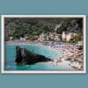 White framed print of a crowded beach in Monterosso al Mare in Cinque Terre, Italy. Shot by Photographer Scott Allen Wilson.