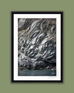 Black framed print of a rock wall in Monterosso al Mare in Cinque Terre, Italy. Shot by Photographer Scott Allen Wilson.