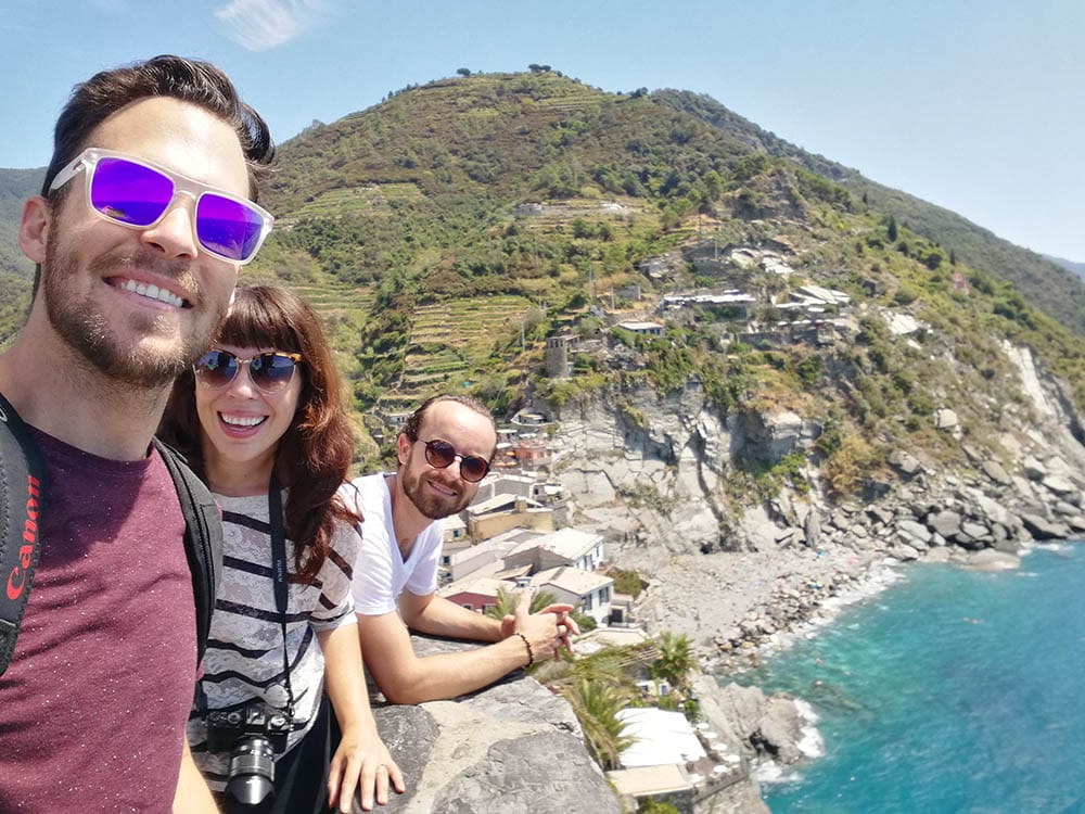 Photographer Scott Allen Wilson, and Georgette Jupe (also seen in the print Girl In Florence) and her husband Nico posing for a photo together in Vernazza, Italy.