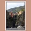 White framed print of the rocky coastline in Monterosso al Mare in Cinque Terre, Italy. By Photographer Scott Allen Wilson.