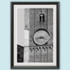 Black framed black and white print of a detail of the clock tower of Palazzo del Governatore. Captured by Scott Allen Wilson